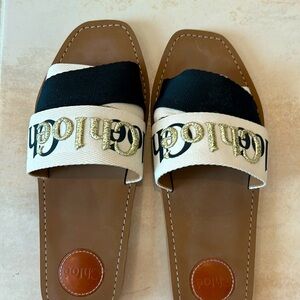Chloe slides size 41.  Black with gold. Very pretty